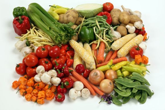 Vegetables - a pile of different types of vegetables on a white surface