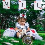 Garden Theme - A Little Girl Posing in an Alice in Wonderland Themed Photoshoot